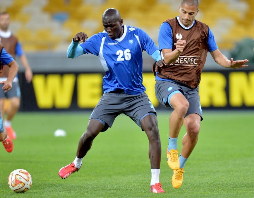 Napoli fans are set to show their support for racism victim Kalidou Koulibaly (centre) by donning masks of the defender
