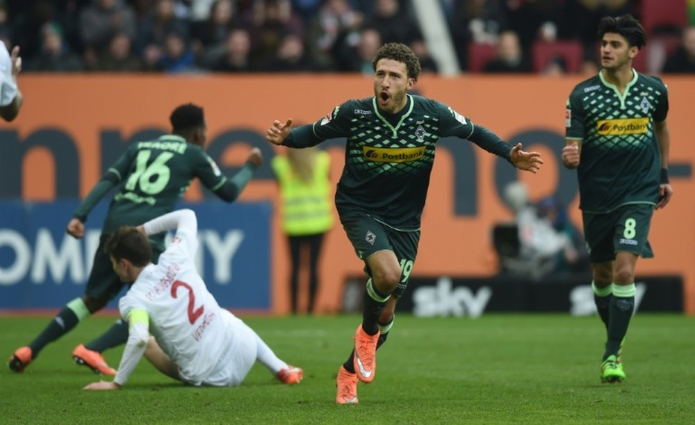 Moenchengladbachs midfielder Fabian Johnson celebrates a goal at the German first division Bundesliga football match against FC Augsburg on February 28, 2016