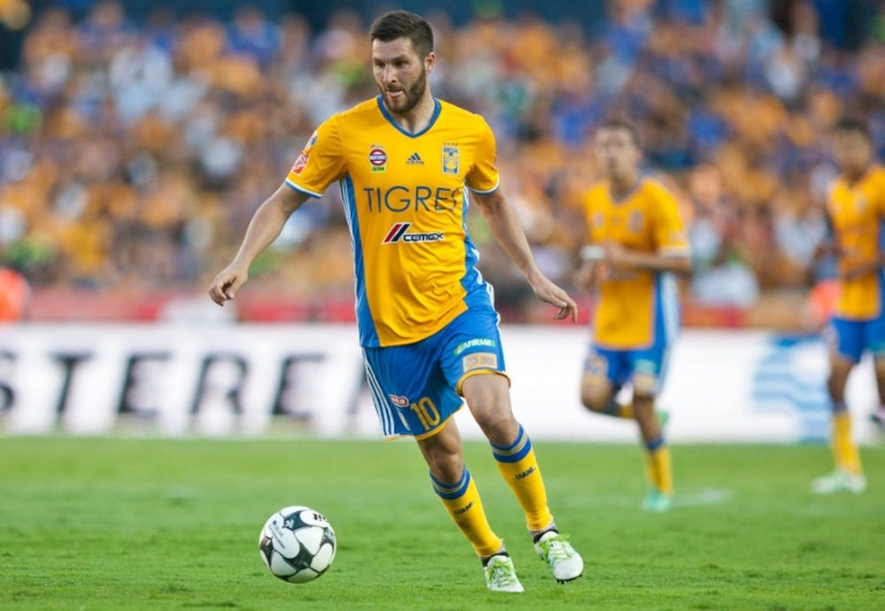Tigres player, French Andre-Pierre Gignac, controls the ball the 2016 Mexican Apertura tournament football match against Atlas, at the Universitario stadium in Monterrey, Mexico on July 23, 2016