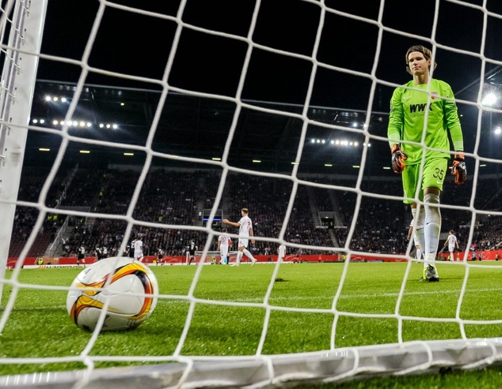 Augsburgs keeper Marwin Hitz reacts in Augsburg, southern Germany on October 1, 2015
