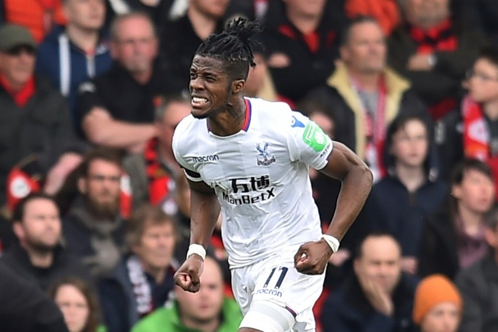 Reports claim Chelsea will do all they can to sign Zaha. AFP