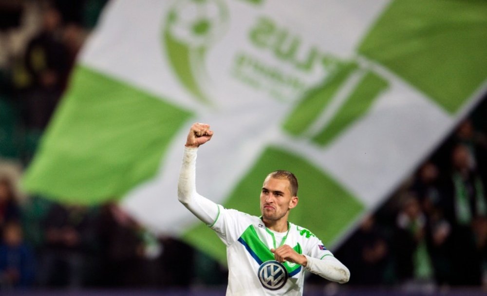 Wolfsburgs forward Bas Dost celebrates in Wolfsburg, northern Germany on October 21, 2015