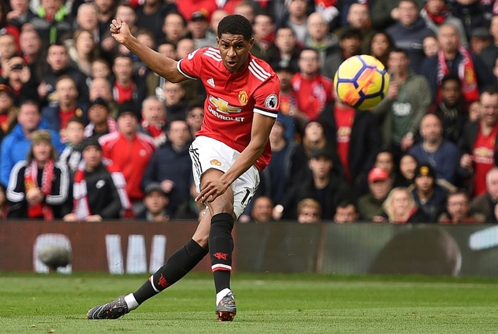Cole says Rashford can benefit from learning on the wing. AFP