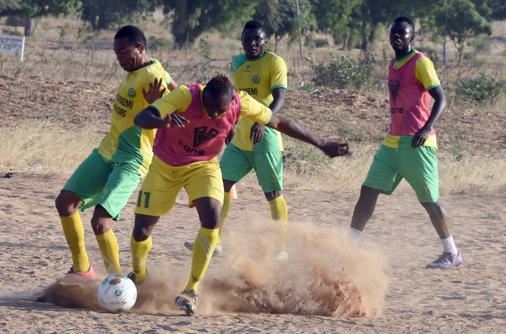 Players of El Kanemi Warriors FC train on a sandy pitch in Maiduguri, on February 2, 2016