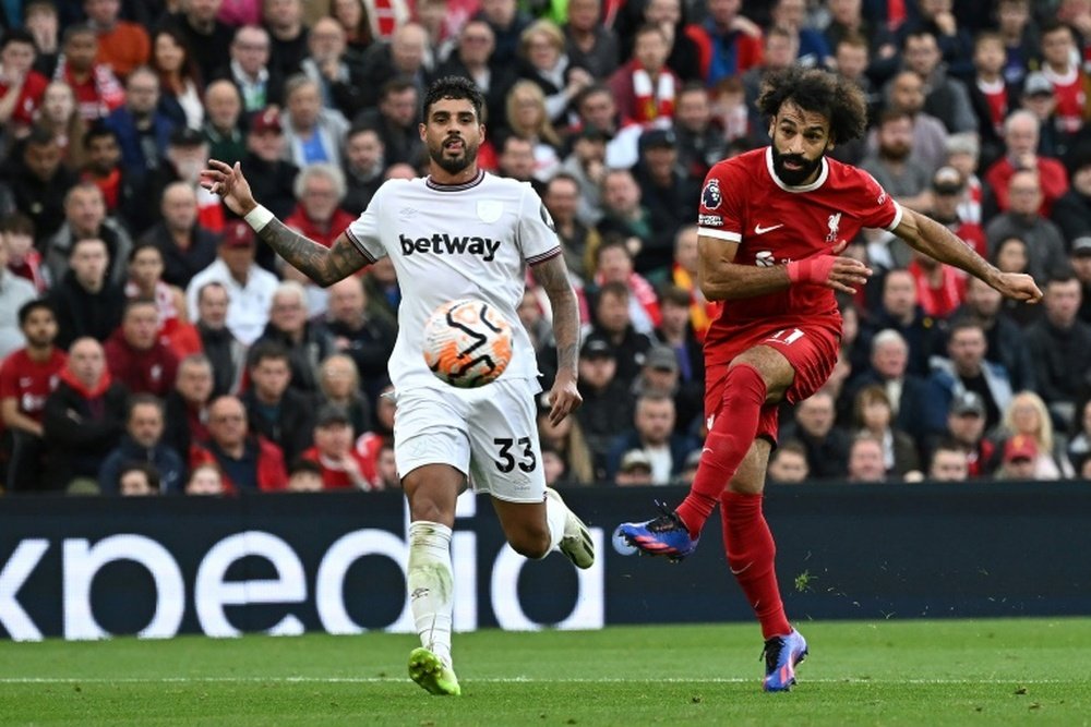 Salah (R) scored in Liverpool's 3-1 win over West Ham. AFP