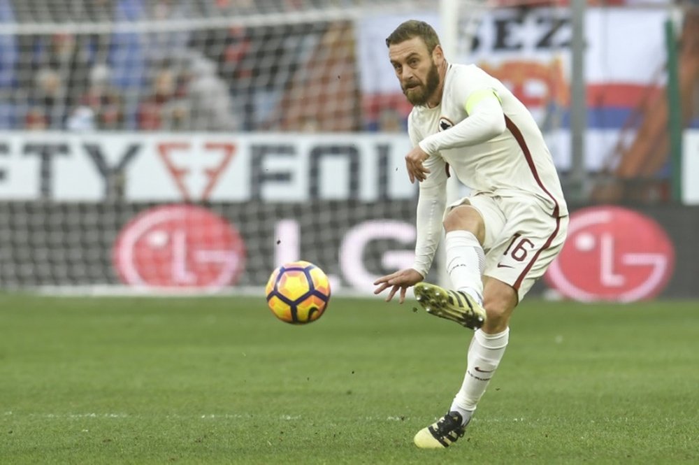 AS Roma's midfielder Daniele de Rossi extended his contract. AFP