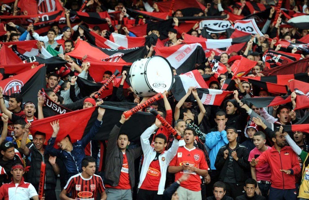 Supporters of Algerias USM Alger club celebrate on May 14, 2013