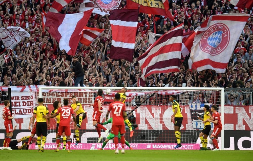 Borussia e Bayern onzes iniciais confirmados. AFP