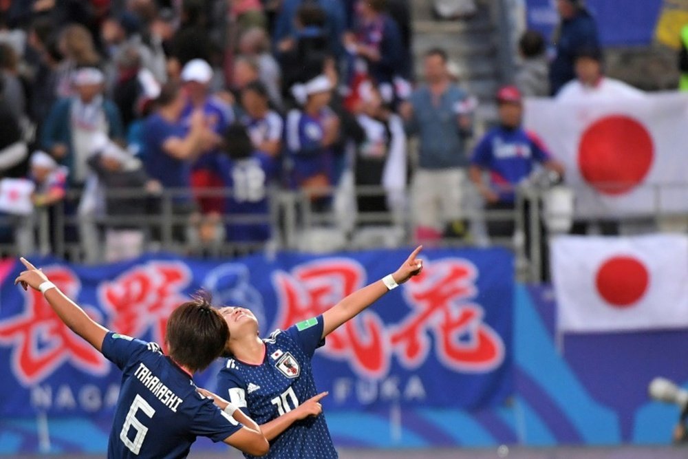 Japan are victorious. AFP