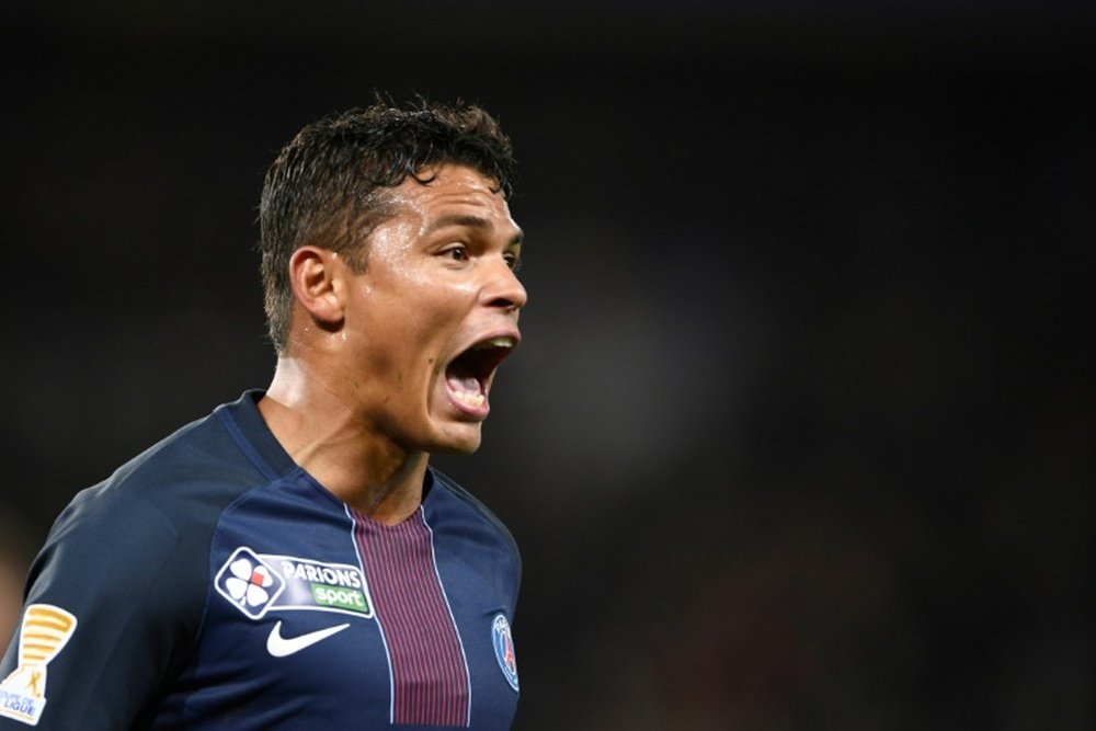 Paris Saint-Germain defender Thiago Silva reacts after scoring a goal. AFP