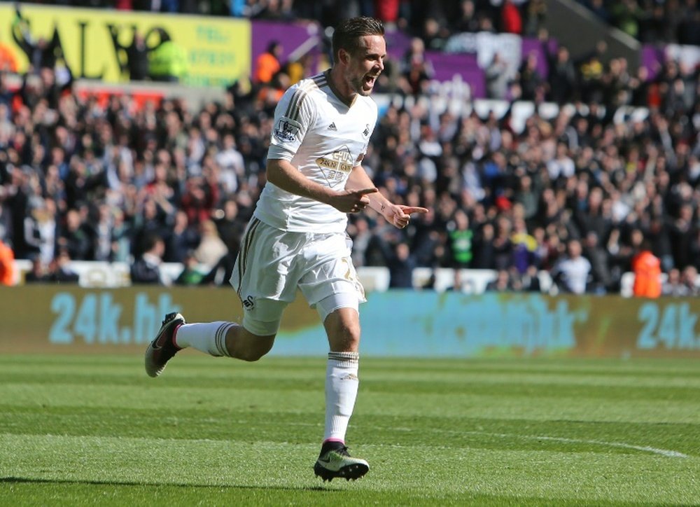 According to Swansea, Sigurdsson might leave the club. AFP