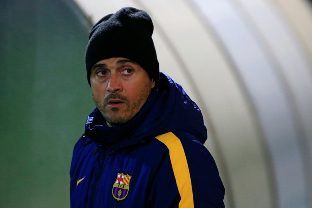 Barcelonas coach Luis Enrique looks on as he arrives at the first training session of the year at the Sports Center FC Barcelona Joan Gamper in Sant Joan Despi, near Barcelona on January 1, 2016