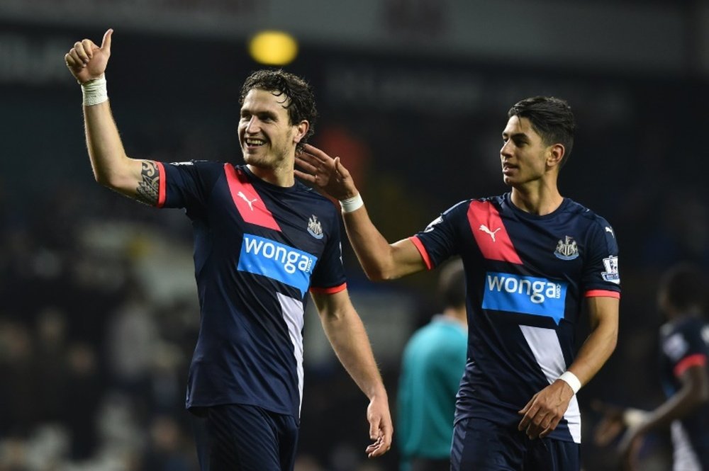 Janmaat (L) is wanted by Watford. AFP