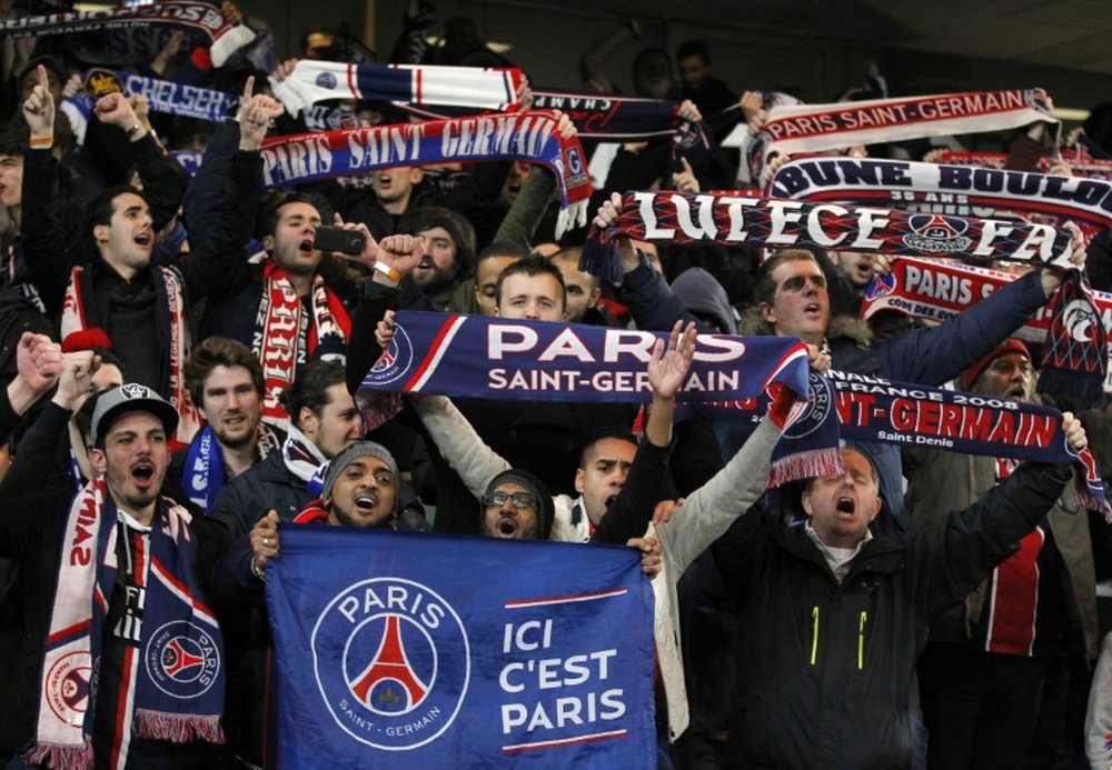 Paris Saint Germain fans set off fireworks during Wednesday's European cup match. AFP