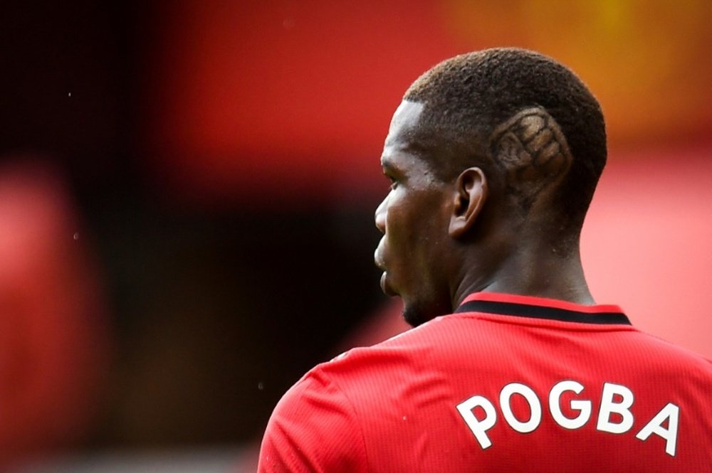 Pogba makes a statement with his hairstyle. AFP