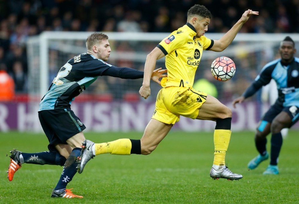 Wycombe Wanderers Jason McCarthy and Aston Villas Riccardo Calder during their FA Cup third-round match on January 9, 2016