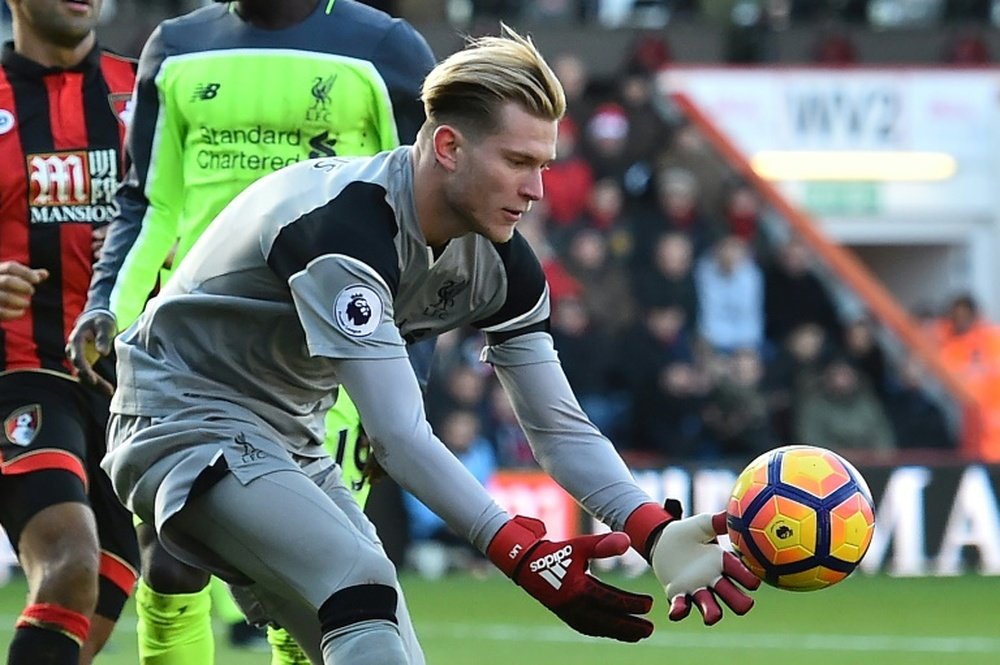 Liverpools German goalkeeper Loris Karius gathers the ball during their match against Bournemouth on December 4, 2016