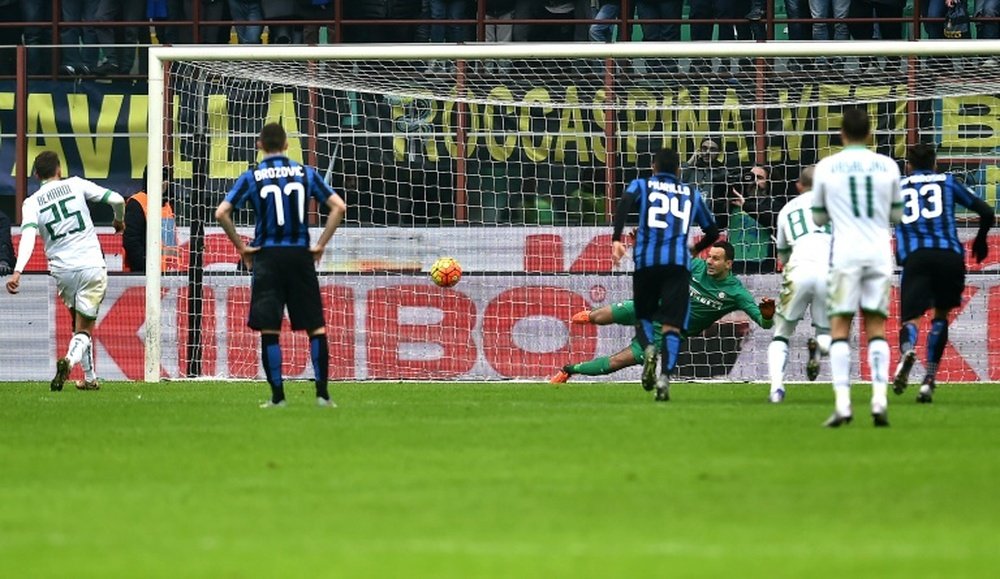 Sassuolo striker Domenico Berardi (left) scores a last-gasp penalty to stun Inter Milan 1-0