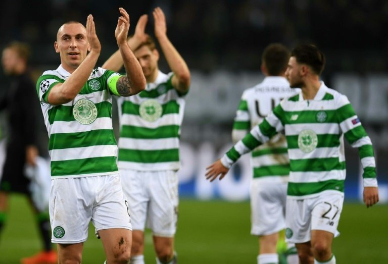 Scott Brown is hoping Celtic can continue their unbeaten domestic run into the new season. AFP