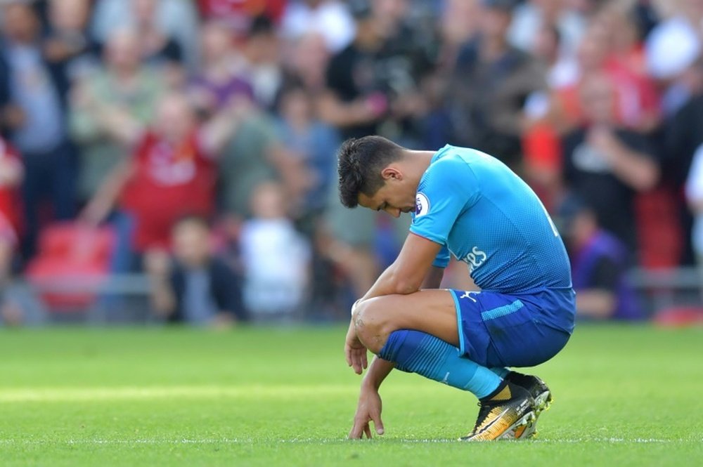 Neville thinks Sanchez has lost the support of the Arsenal fans. AFP