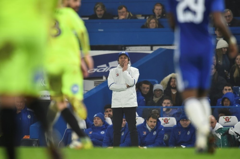 Chelseas head coach Antonio Conte watches from the touchline at Stamford Bridge in London on January 8, 2017