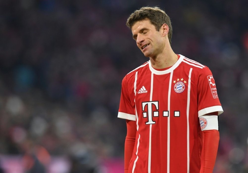 Mueller shines on return as Bayern extend lead