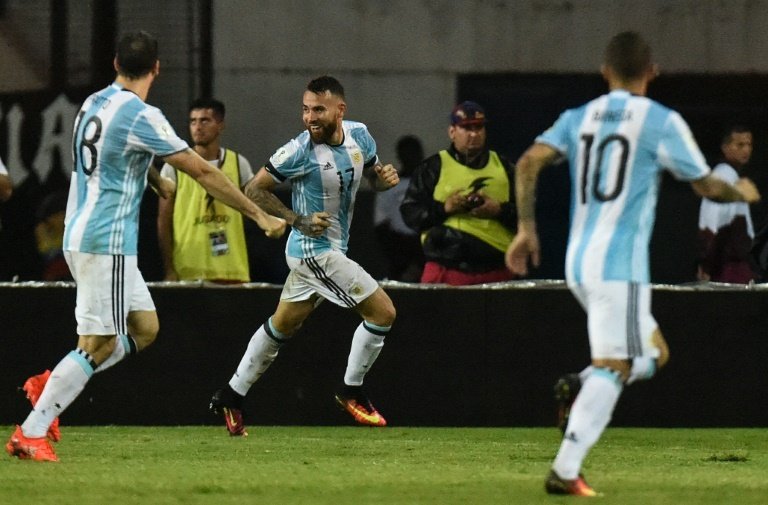Messi-less Argentina fight back to deny Venezuela