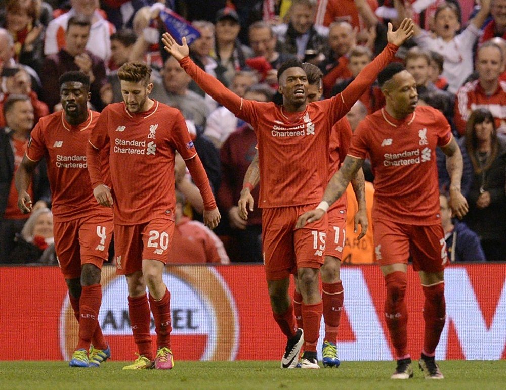 Liverpools striker Daniel Sturridge (C) celebrates after scoring his teams second goal during the UEFA Europa League semi-final second leg football match between Liverpool and Villarreal CF in Liverpool, England on May 5, 2016