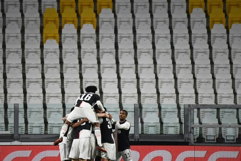 Juventus anuncia uma economia de 90 milhões com reduções salariais. AFP