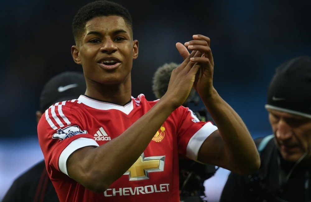 Manchester Uniteds striker Marcus Rashford applauds at the Etihad Stadium on March 20, 2016