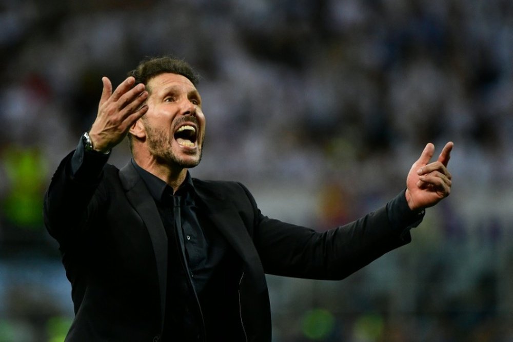 Atletico Madrids Argentinian coach Diego Simeone reacts after Real Madrid won the UEFA Champions League final football match between Real Madrid and Atletico Madrid at San Siro Stadium in Milan, on May 28, 2016