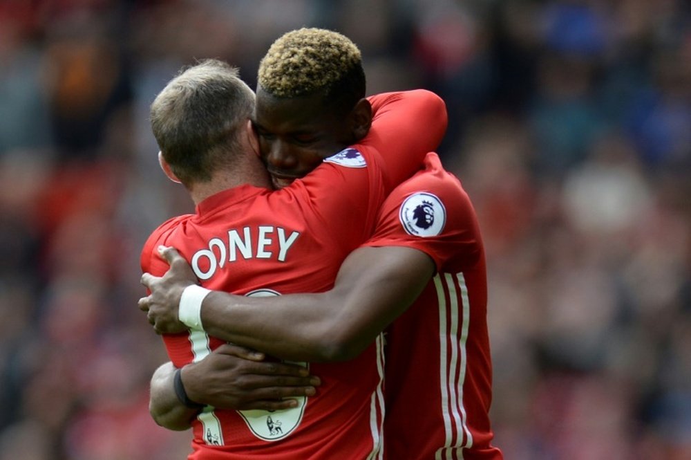 Rooney urges United to use Pogba in box-to-box role. AFP