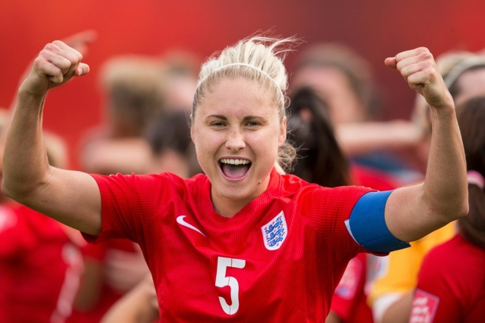 Man City captain Steph Houghton and Reading captain Kirsty Pearce battled before kick off. AFP