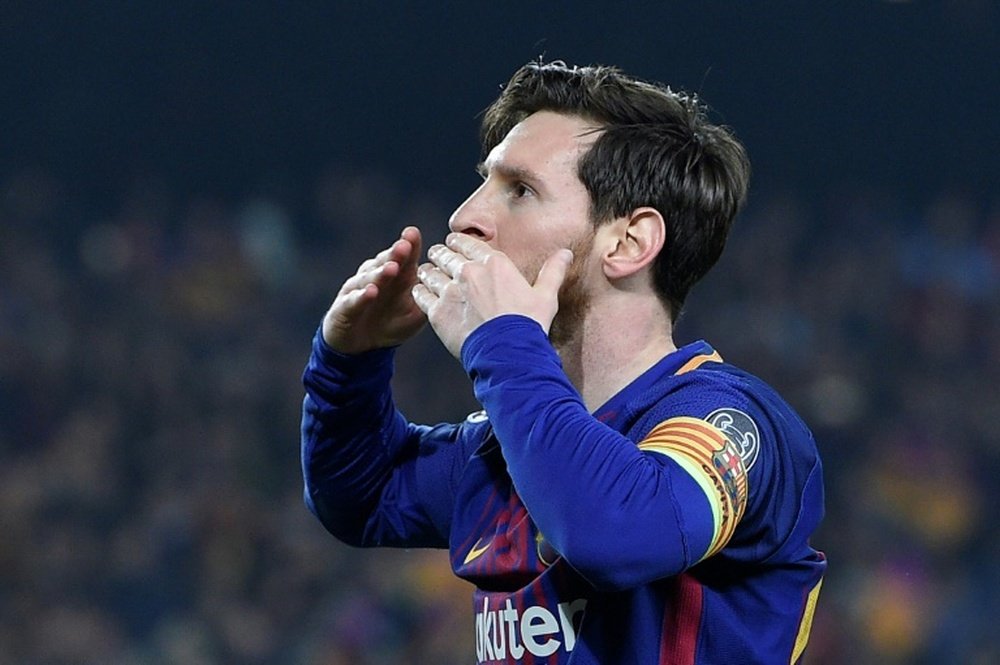 Messi scored twice to bring up 100 Champions League goals. AFP
