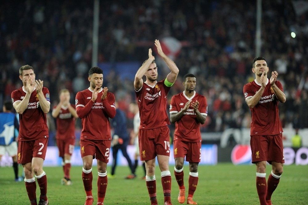 Henderson says that Liverpool let themselves down against Sevilla. AFP