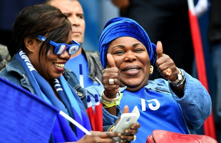 France's Paul Pogba, his mother Yeo and his brothers celebrate