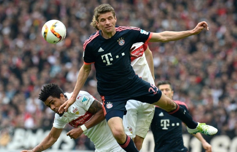 Stuttgarts midfielder Daniel Didavi and Bayern Munichs forward Thomas Mueller battle. BeSoccer
