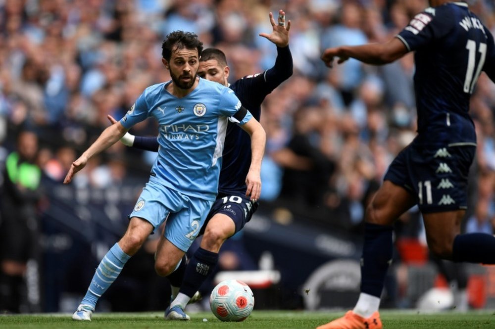 Bernardo Silva (L) could leave Man City. AFP