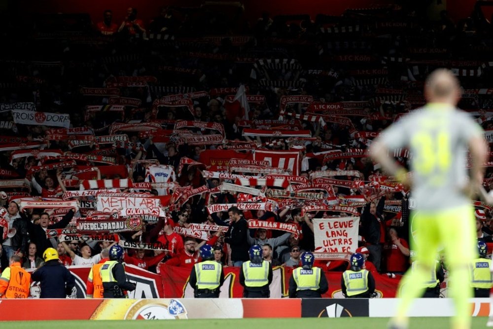 La UEFA ha castigado al Köln por los disturbios de sus fans. AFP/Archivo