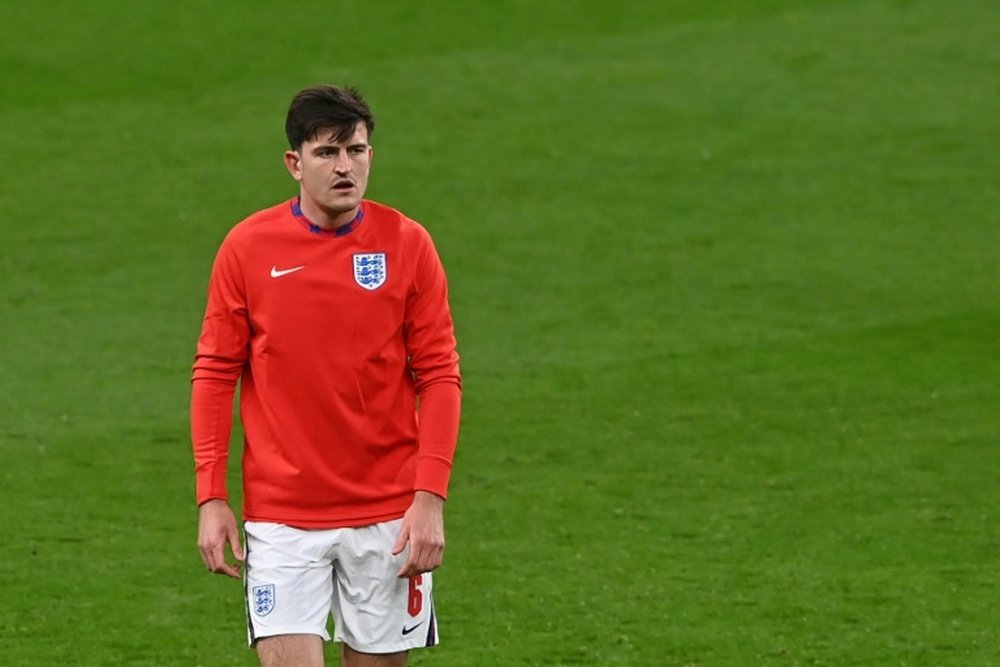 Maguire said his father suffered broken ribs during the disturbances at Wembley. AFP