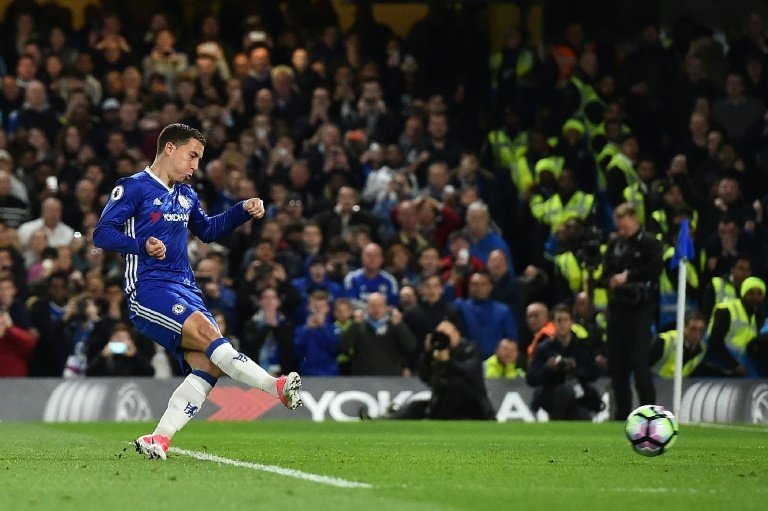 Chelseas midfielder Eden Hazard scores his teams second goal during the English Premier League