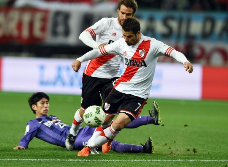 River Plate's Rodrigo Mora (front) in action during the Club World Cup semi-final against Sanfrecce Hiroshima in Osaka, on December 16, 2015