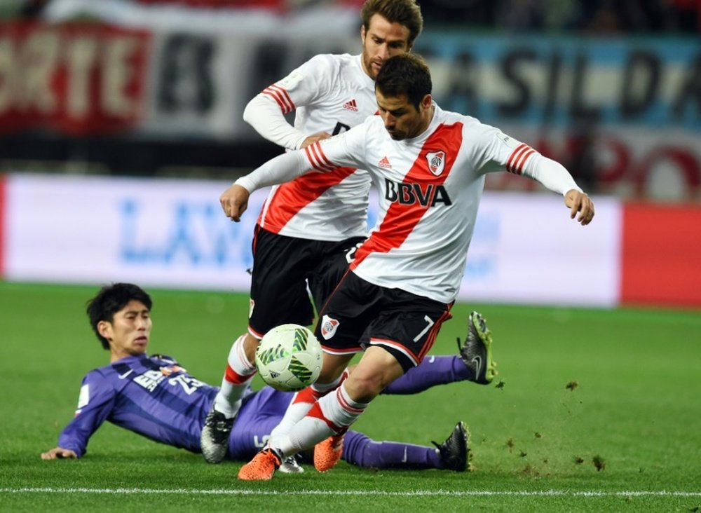 River Plate's Rodrigo Mora (front) in action during the Club World Cup semi-final against Sanfrecce Hiroshima in Osaka, on December 16, 2015