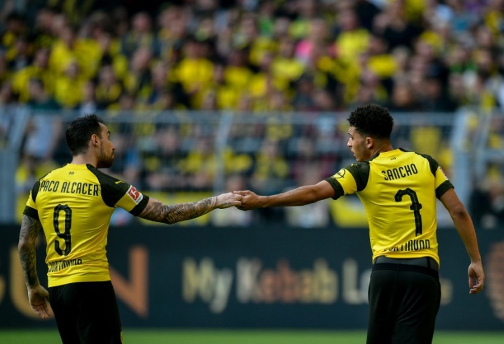Borussia garante a liderança nos acréscimos. AFP