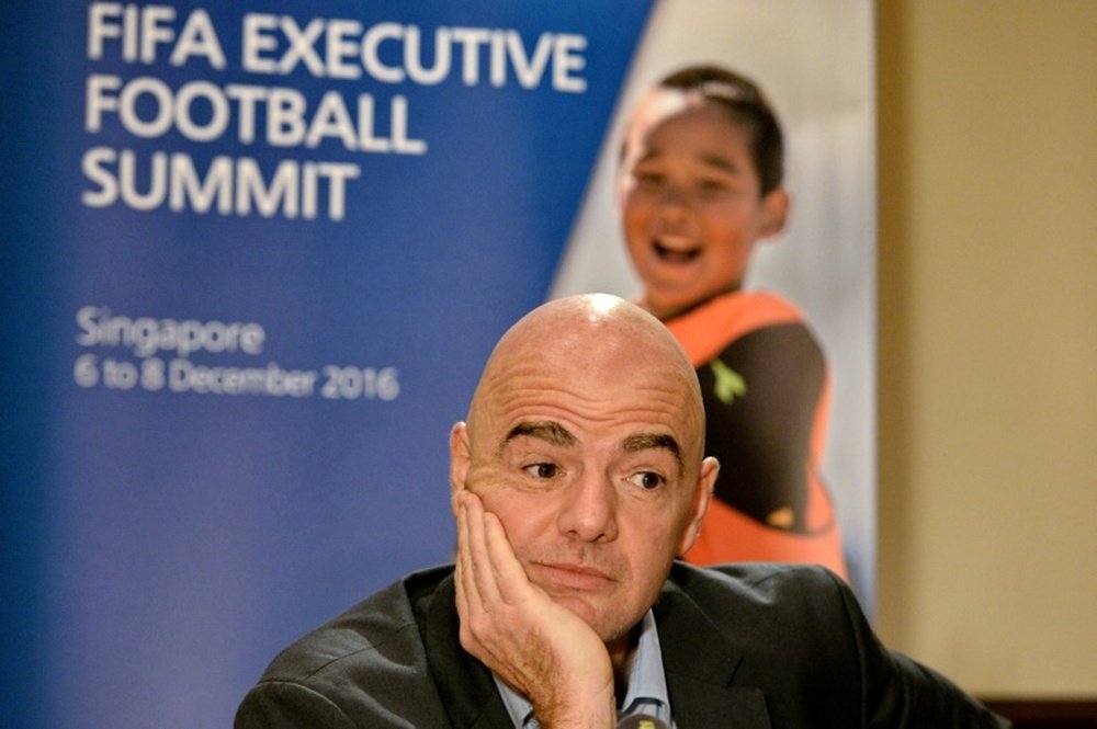 FIFA President Gianni Infantino attends a media briefing after the FIFA Executive Football Summit in Singapore, on December 8, 2016