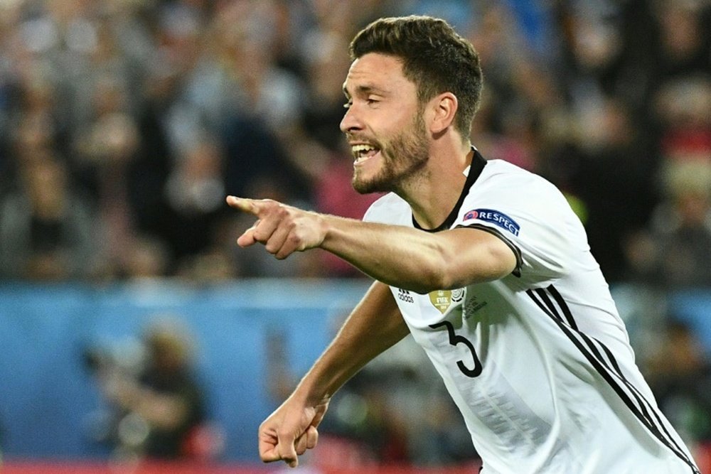 Jonas Hector scores a spot-kick in a penalty shoot-out to clinch the match for Germany in the Euro 2016 quarter-final in Bordeaux on July 2, 2016