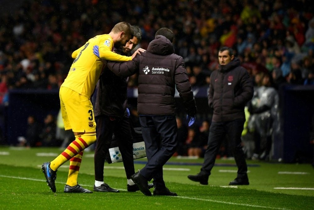 Inquiétude face à la blessure de Piqué. AFP