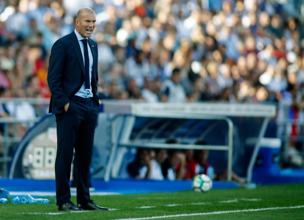 Zidane says his side will travel to Catalonia as normal. AFP