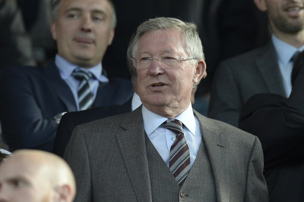 Manchester Uniteds former manager Alex Ferguson, pictured on September 12, 2015, claims the suits worn by Liverpools squad prior to the 1996 FA Cup final gave Manchester United the edge even before kick-off