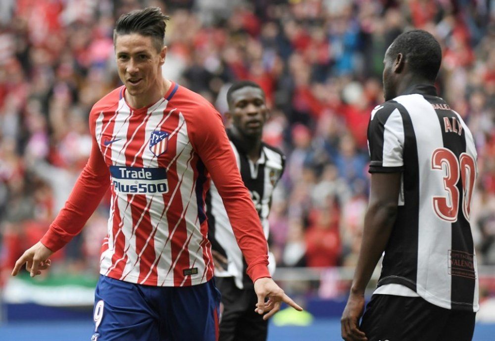 Torres scored Atletico's third goal of the match. AFP